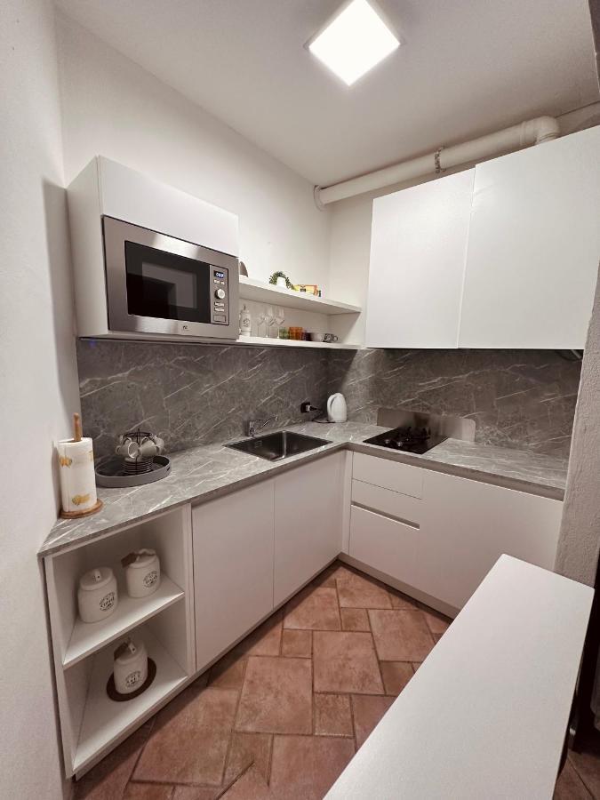 La Casa Del Corso Appartement Arona Buitenkant foto